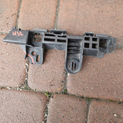 Ślizg mocowanie błotnika lewy uchwyt wspornik Opel ADAM 13495490