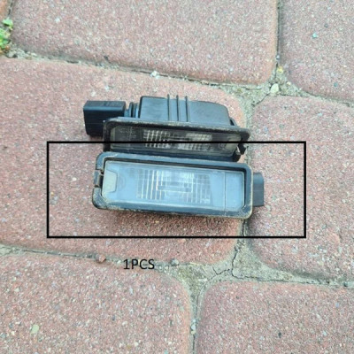 Oświetlenie tablicy rejestracyjnej 1szt Volkswagen Golf VII 1K8943021