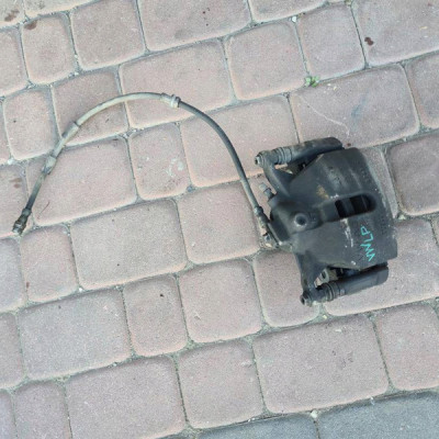 Zacisk przód lewy jażmo przedni Volkswagen Golf VII 7