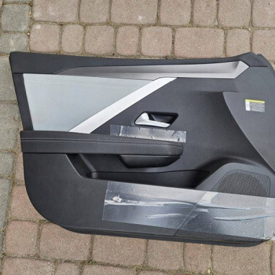 Boczek tapicerka drzwi prawy skóra lewy OPEL ASTRA L 6 VI 98519977ZS